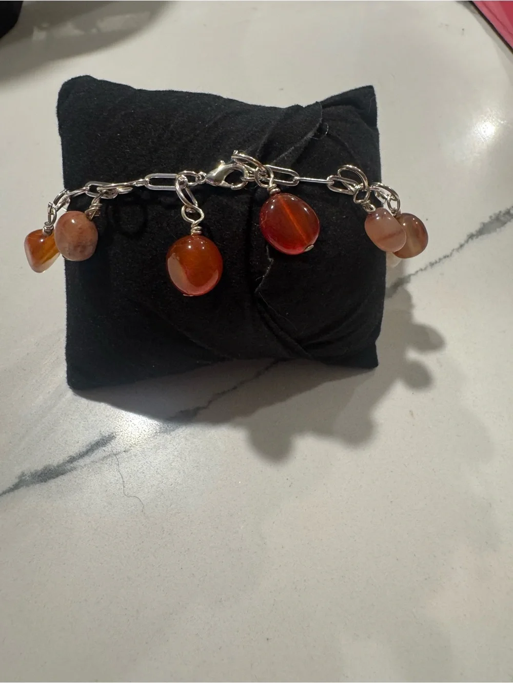 Handcrafted Silver Charm Bracelet with moonstone and carnelian stone accents